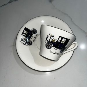Antique Peugeot car cup and saucer